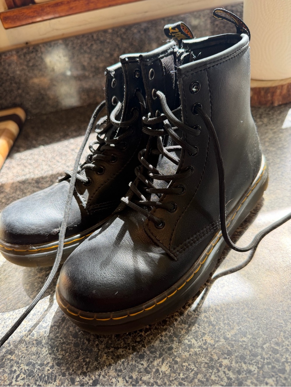 Dr. Martens Black Leather Lace-Up Kids Boots with Yellow Stitching